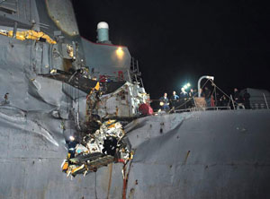 U.S. Guided Missile Destroyer Collides with Tanker in Gulf