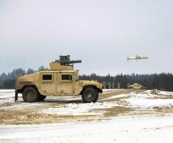 Raytheon Fires TOW 2A RF Missiles from Helicopter