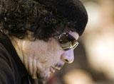 China Denies Arming Qaddafi