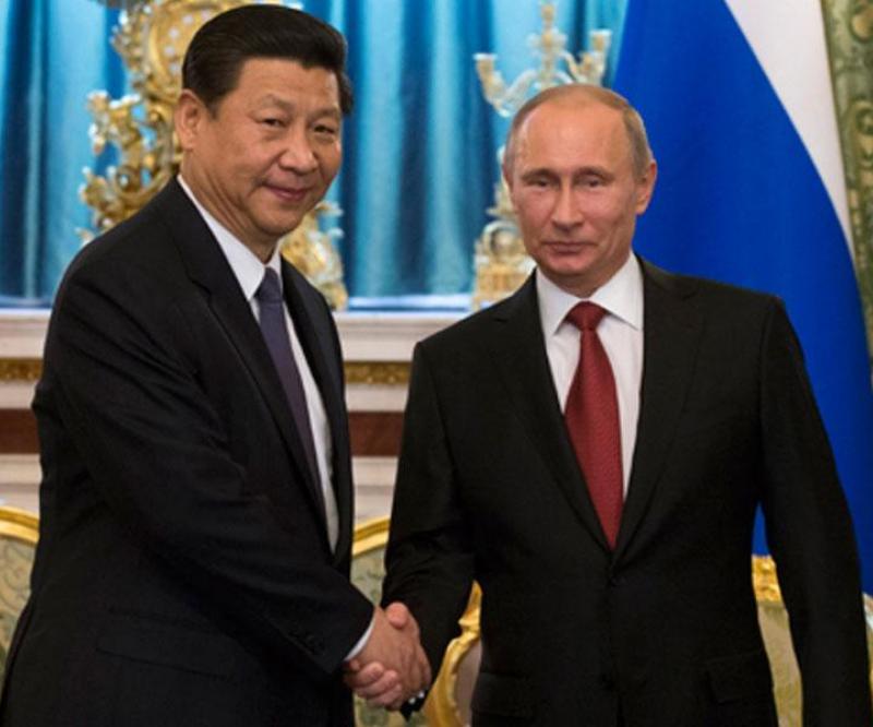 China Vows Stronger Military Ties with Russia