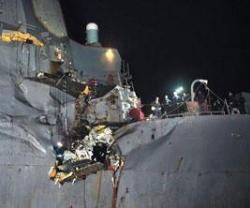 U.S. Guided Missile Destroyer Collides with Tanker in Gulf