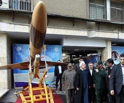Iran Displays Combat Drone Armed with Missiles